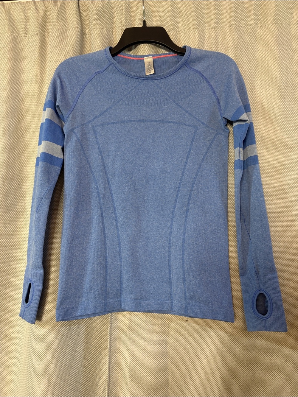 Ivivva Light Blue Long Sleeve Performance Tee fits up to a woman’s small